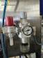 Stainless steel filling machine for beer liquids in Brabeer bottles