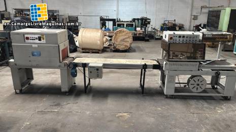 Automatic L-sealer with shrink tunnel. Automatic L-sealer with shrink tunnel.