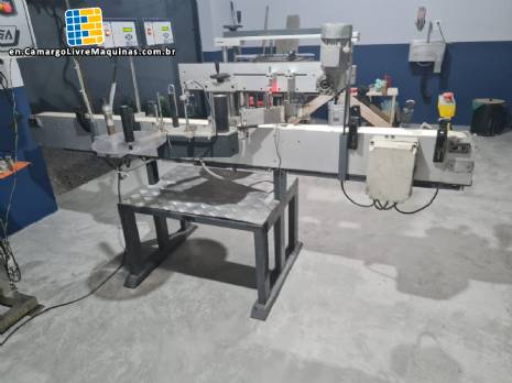 Automatic labeling machine for bottles, jars, and containers, for self-adhesive labels. Automatic labeling machine for bottles, jars, and containers, for self-adhesive labels.