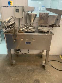 Erli semi-automatic stainless steel capping and filling machine for capsules 0 and 1. Erli semi-automatic stainless steel capping and filling machine for capsules 0 and 1.